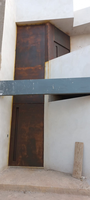 Casa do Corten - Porta pivotante em Aço Corten Whats